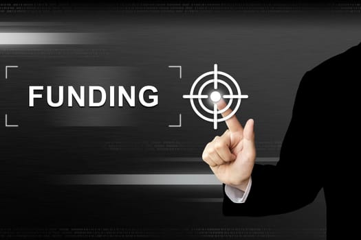 business hand clicking funding button on a touch screen interface