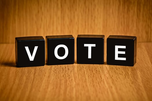 Vote text on black block