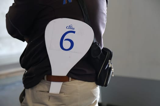 10 May 2019 Portugal Madeira Teleferico cable car station, men stand back number six, group guide tourism travel ship tourist travel. High quality photo