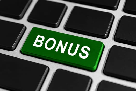 Bonus green button on keyboard, business concept
