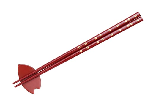 Chopsticks and chopsticks rest isolated on white background