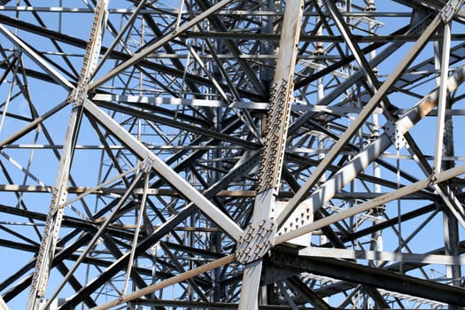 steel framework against a blue sky