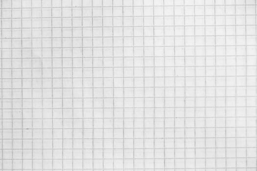 Part of the surface checkered paper. macro photo