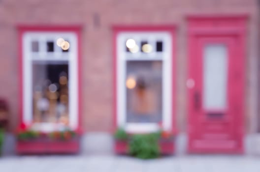 Blurred abstract image of window shop display or cafe with bokeh lights background