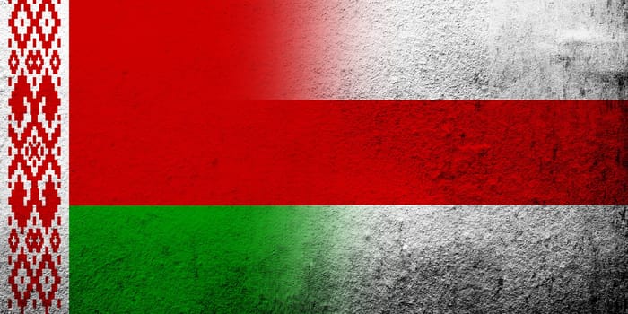 The national red and green flag of Belarus with White-red-white flag of Belarusian democracy movement. Grunge background