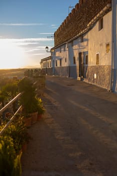 Galisteo, beautiful walled town from Alagon Valley. Whitewashed house attached to wall. Extremadura, Spain