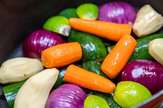 Fresh and tasted vegetables in the plate, ready to be cooked