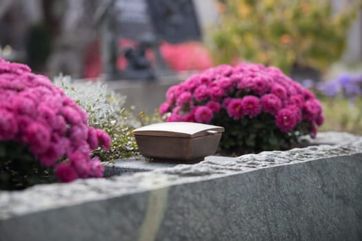 Holy water in iron bowl, cemetery