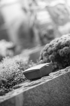 Holy water in iron bowl, cemetery