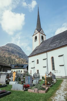Cemetery with graves and church