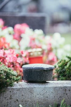 Holy water in iron bowl, cemetery