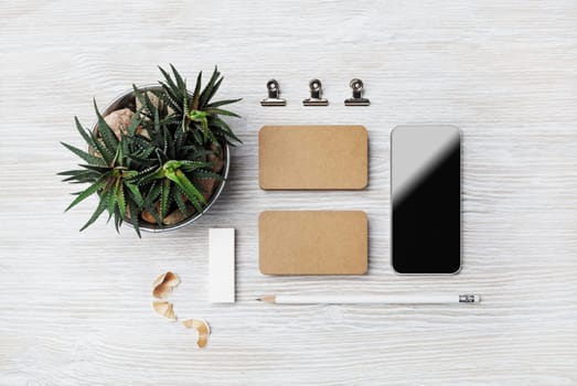 Branding stationery template. Blank corporate identity set on light wood table background. Flat lay.