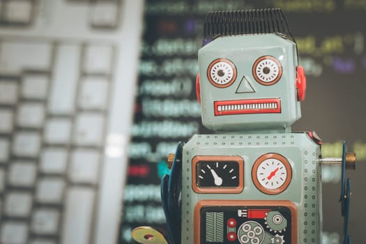 Symbol for a chatbot or social bot and algorithms, program code in the background