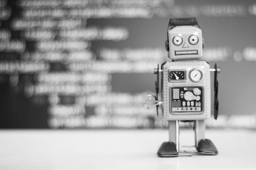 Symbol for a chatbot or social bot and algorithms, program code in the background