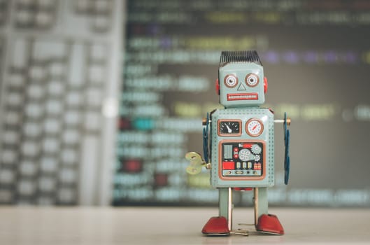 Symbol for a chatbot or social bot and algorithms, program code in the background