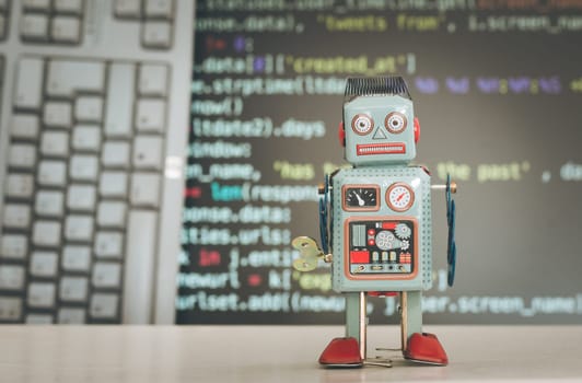 Symbol for a chatbot or social bot and algorithms, program code in the background