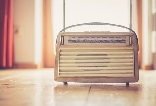 Vintage Radio on the floor, wood