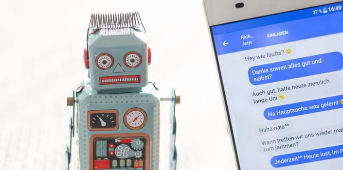 Symbol for chat bot, smartphone and messenger