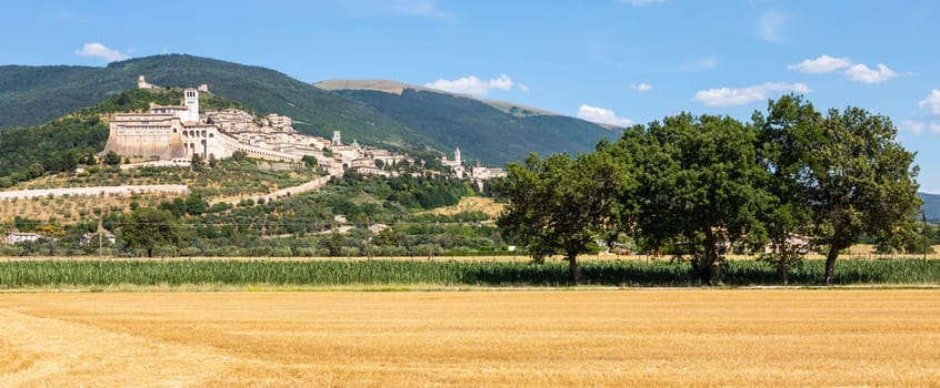 Assisi village in Umbria region, Italy. The town is famous for the most important Italian St. Francis Basilica (Basilica di San Francesco)