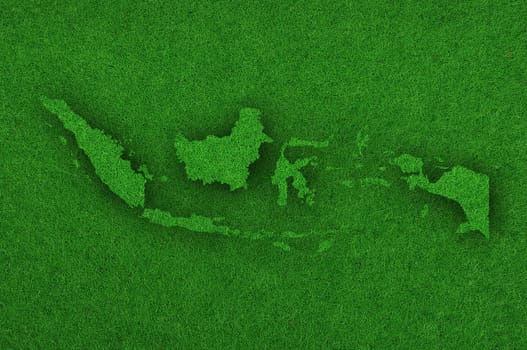 Map of Indonesia on green felt