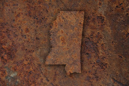 Map of Mississippi on rusty metal