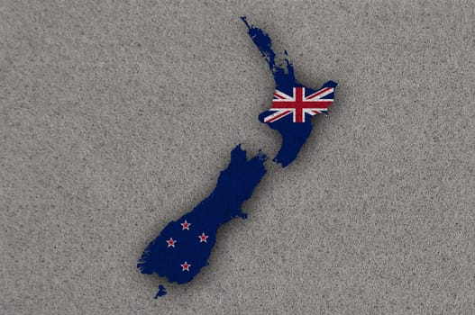 Map and flag of New Zealand on felt