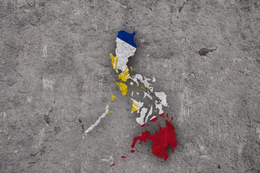 Map and flag of Philippines on weathered concrete