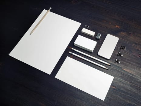 Blank stationery set on wood table background. Template for branding identity. For graphic designers presentations and portfolios.
