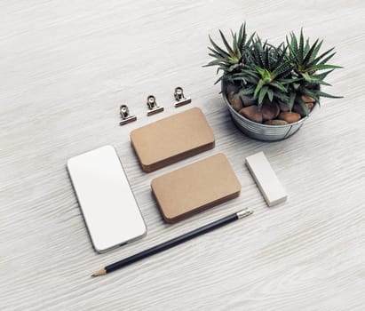 Blank stationery set on light wood table background. Template for branding design. Branding mock up.