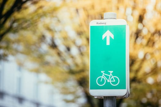 Street sign for cycle path, europe, autumn time