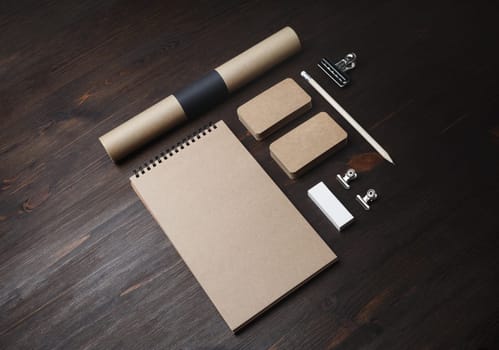 Vintage branding mock up. Photo of blank corporate stationery on wooden background.