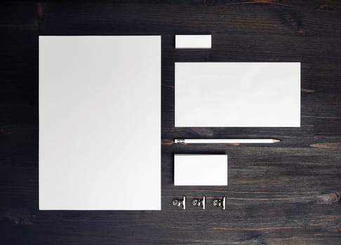 Blank corporate stationery set on wooden background. Template for branding design. Branding mock up. Flat lay.
