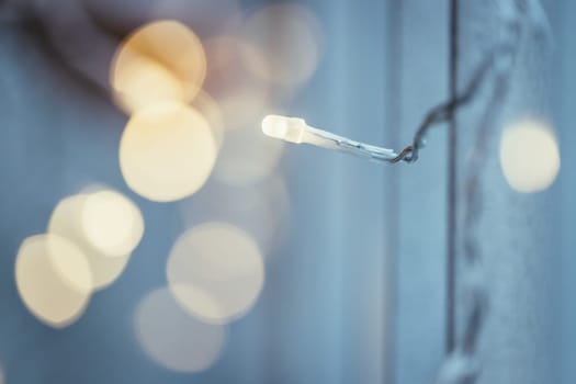 Closeup picture of christmas lightning and decoration, shiny background