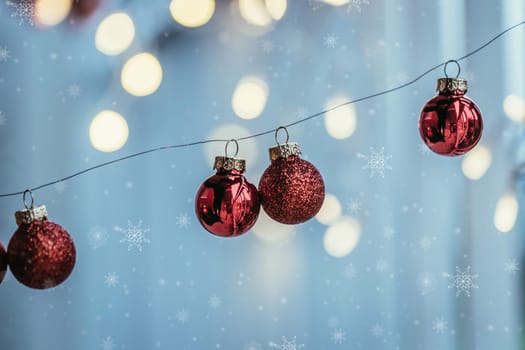 Red christmas baubles on a shiny blurry background