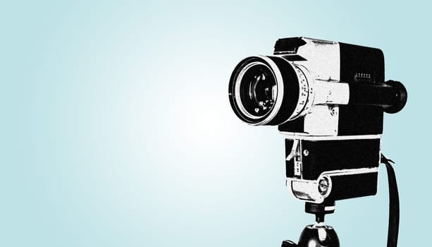 Vintage old movie camera,blue design graphic with copy space
