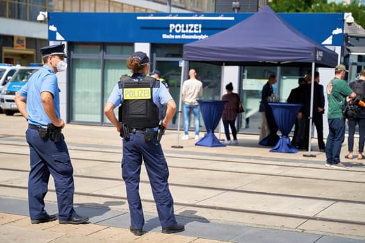 Police presence in front of the mobile police station on Alexanderplatz in Berlin