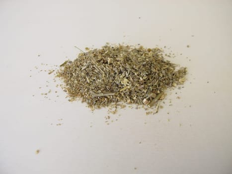 Dried absinthe wormwood herbs on a wooden board, Artemisia absinthium