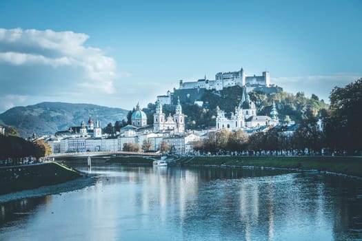Salzburgs old city with fortress Hohensalzburg, blue sky