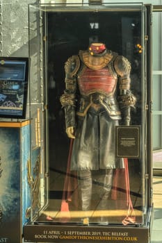 Belfast, UK, Aug 2019 , Jaime Lannister armour from season 6 on display in front of Titanic Store in Titanic museum, Northern Ireland
