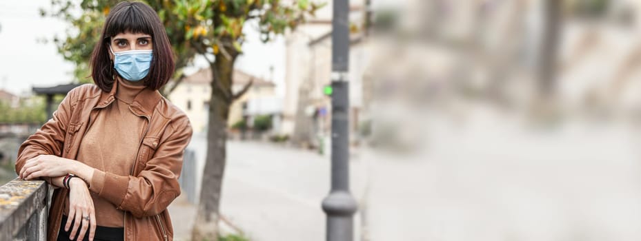 Girl wears mask, banner image with copy space
