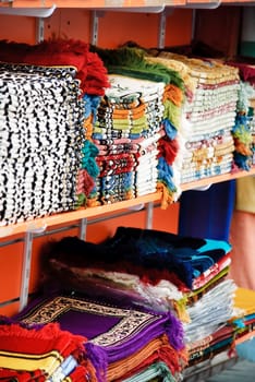 Colorful rugs selling at old souk in Dubai