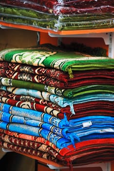 Colorful rugs selling at old souk in Dubai
