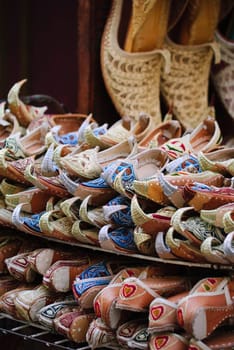 arabic shoes selling at old souk in dubai