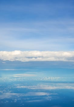 Cloudy blue sky taken from the airplane