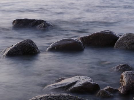 smooth granite stones in sea water long exposure