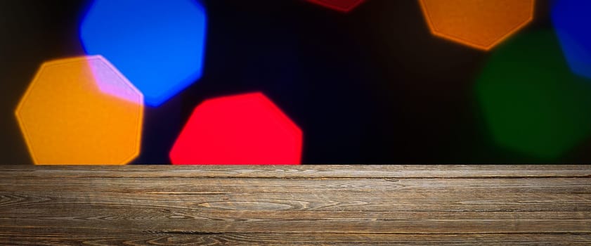 The background is an empty wooden board and a wall of blurred bokeh lights. For product demonstrations, free space, layout, mockup, perspective board, background board.