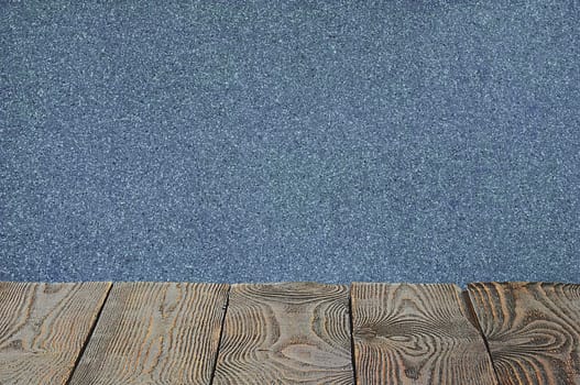 The background is blank wooden boards and a textured plastered wall with lighting and vignetting. For product demonstrations, free space, layout, mockup, perspective board, background board.