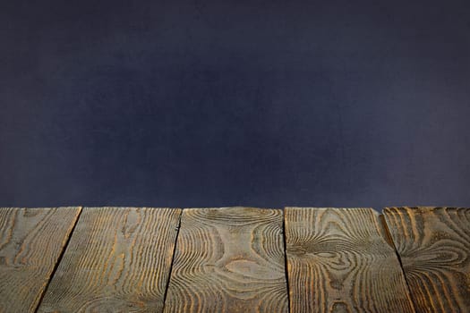 The background is blank wooden boards and a textured plastered wall with lighting and vignetting. For product demonstrations, free space, layout, mockup, perspective board, background board.