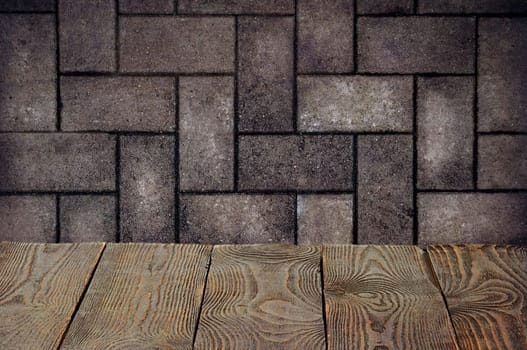 The background is blank wooden boards and a textured brick wall with lighting and vignetting. For product demonstrations, free space, layout, mockup, perspective board, background board.