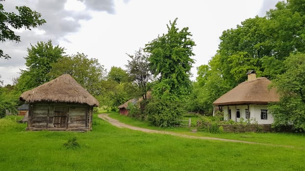 Ukraine, Kiev - June 11, 2020. The old house of peasants in the museum Pirogovo. National Museum of Folk Architecture and Everyday Life of Traditional Folklore Houses of Different Regions of Ukraine.